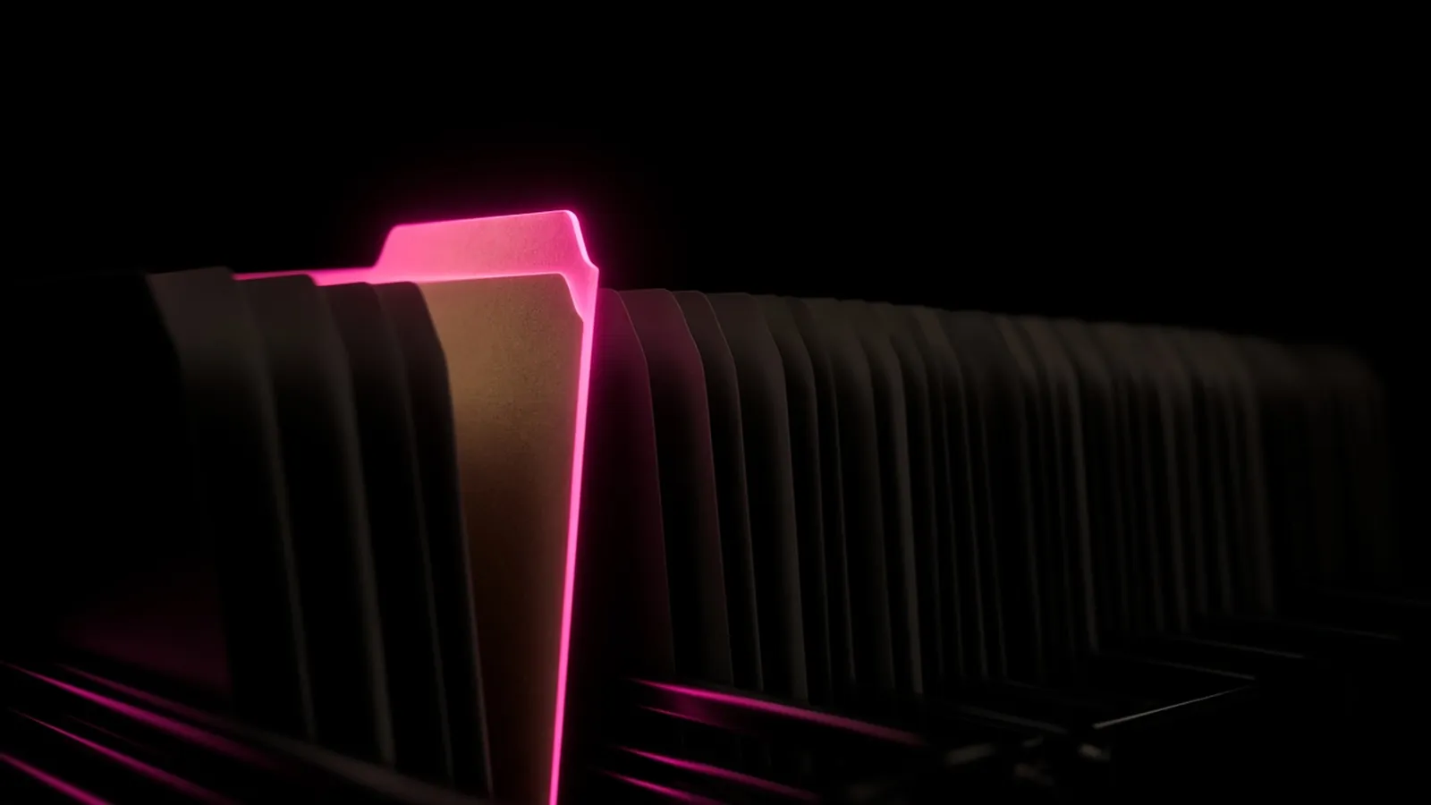 One magenta folder lit among dim shelving on black, the documented file a 401k vendor security review produces