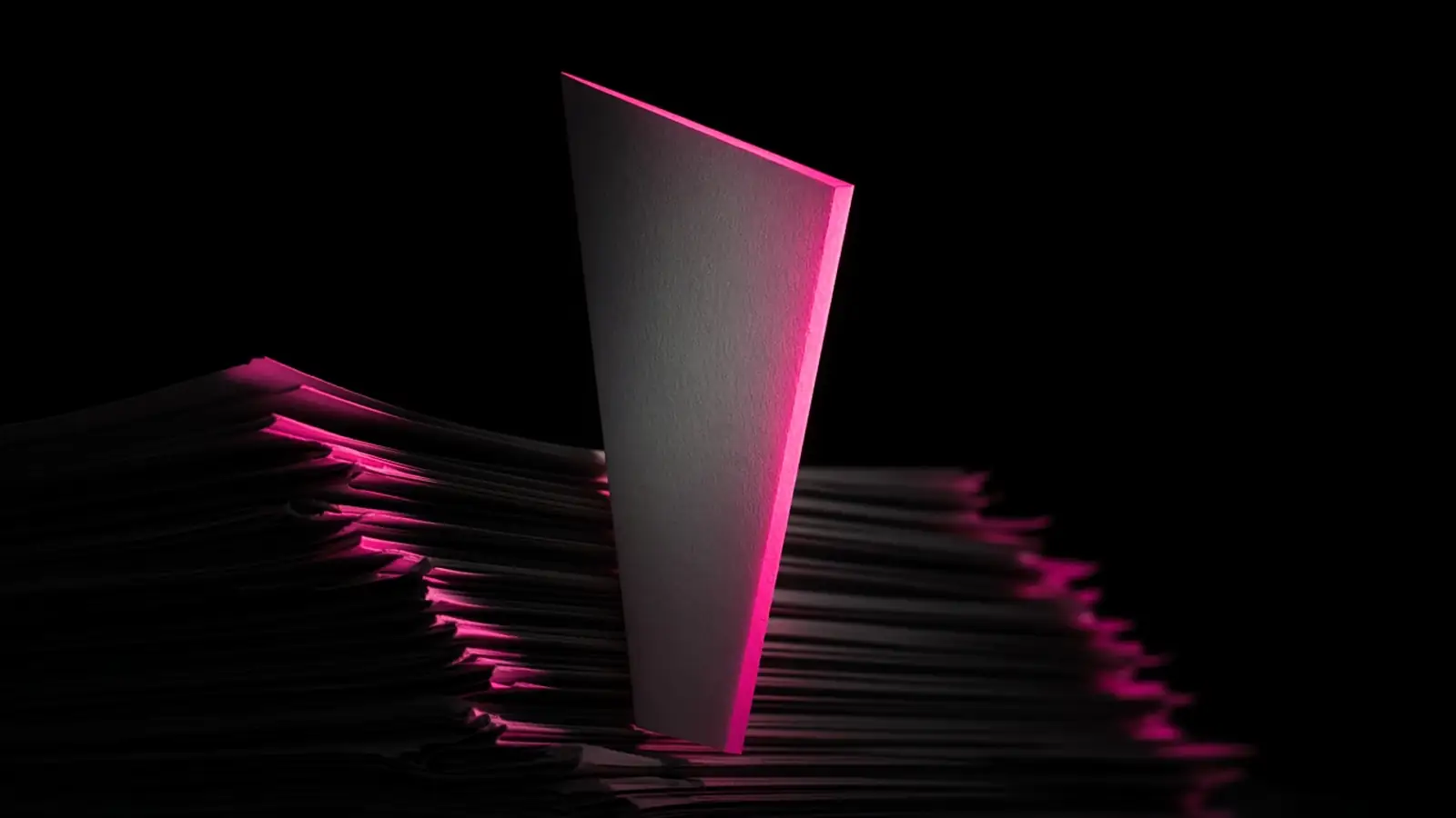 A single magenta-lit form page among dim stacked documents on black, the cyber insurance renewal application