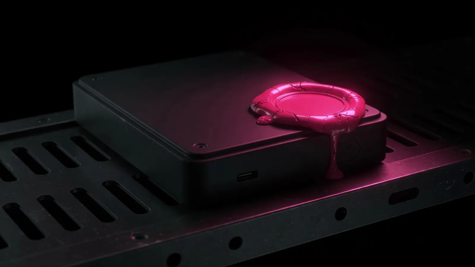 A blank magenta wax seal on a dark backup drive, managed hosting restore test