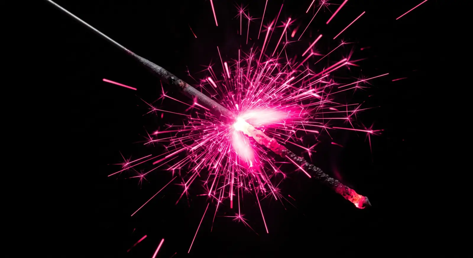 A sparkler burning at its brightest peak and down to its final ember, illustrating the peak-end rule