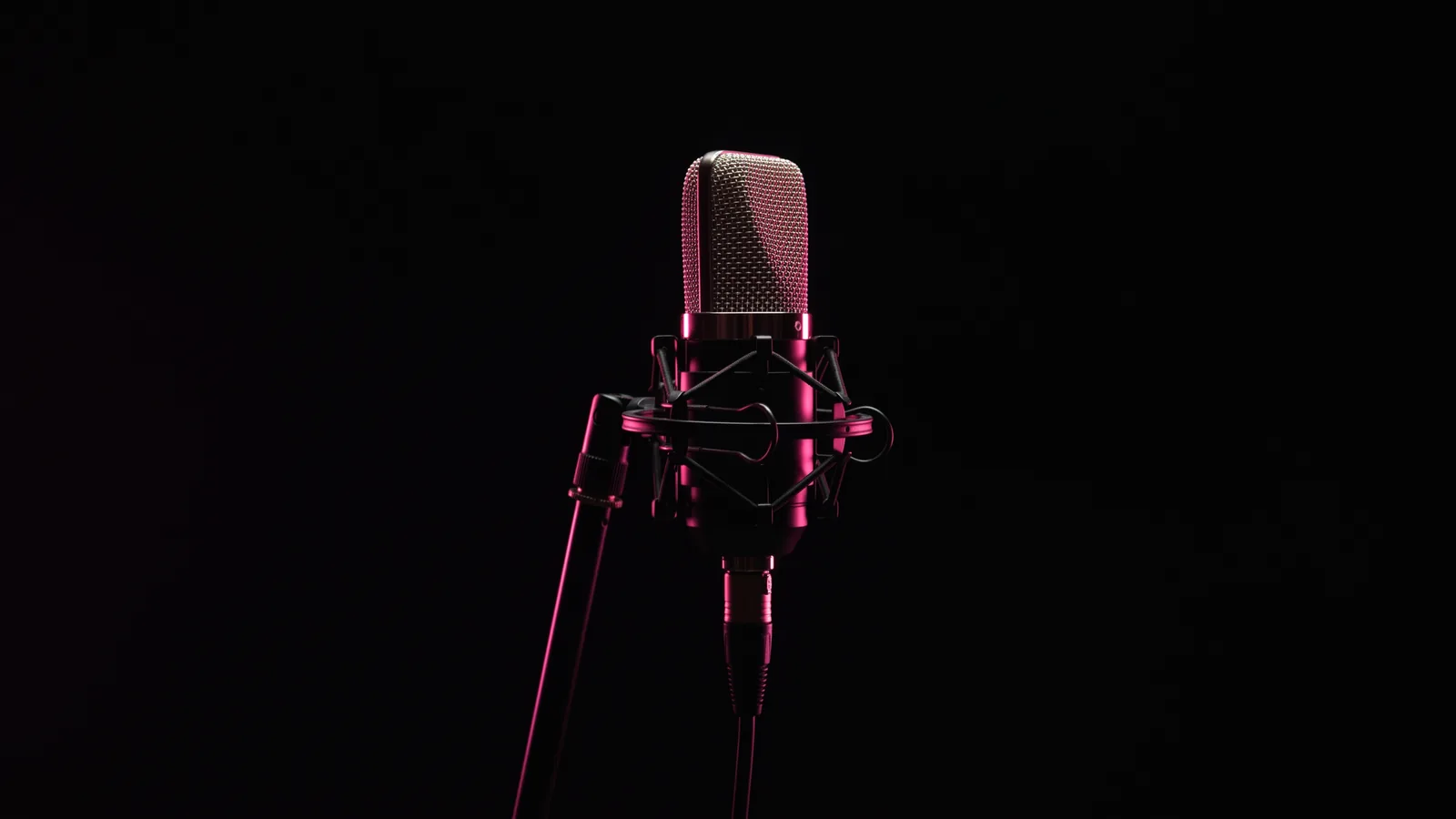 A studio condenser microphone in an empty dark room with a hot pink rim light, representing the AI voice cloning behind modern vishing calls